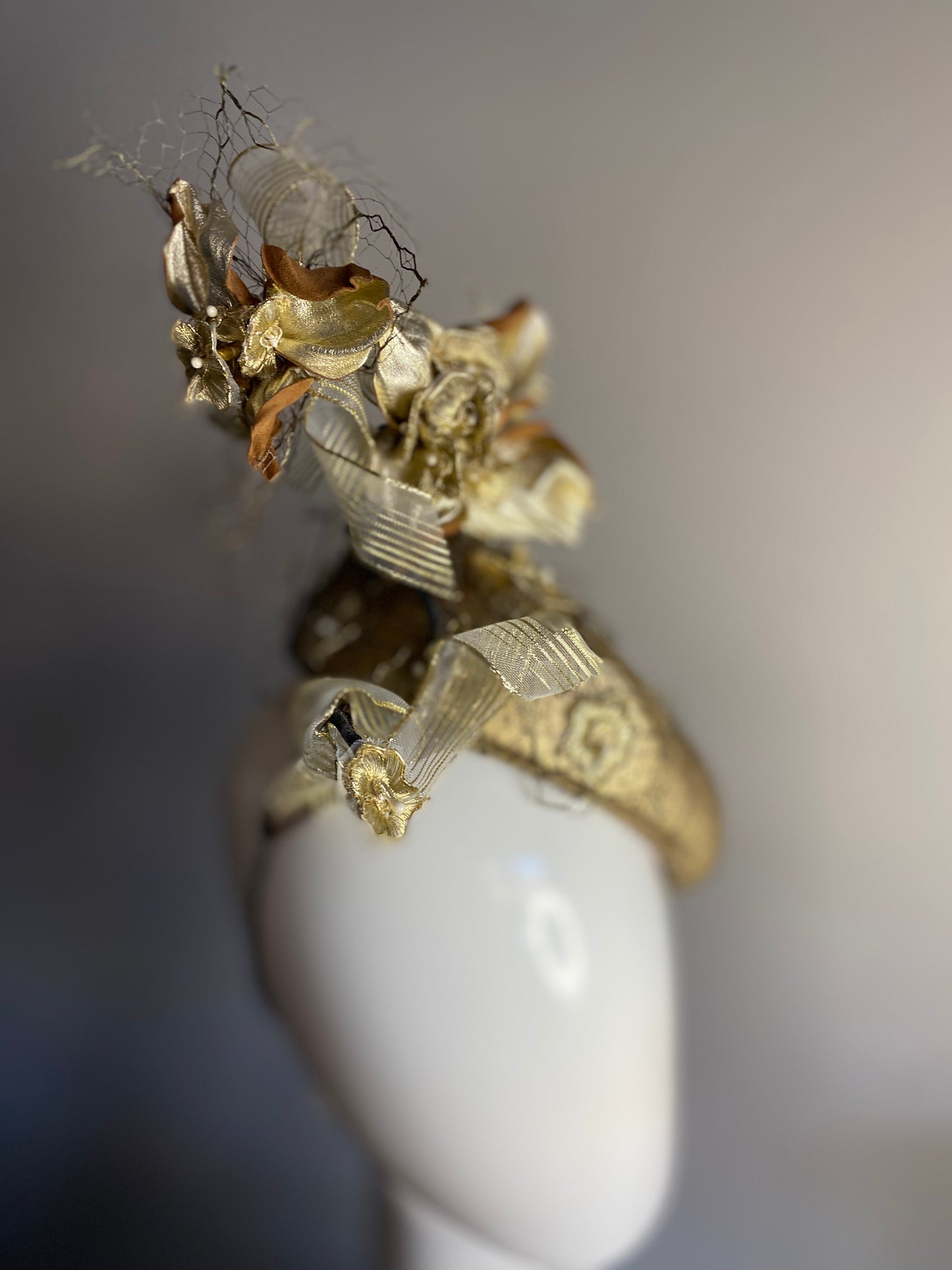 Gold percher with leather flowers