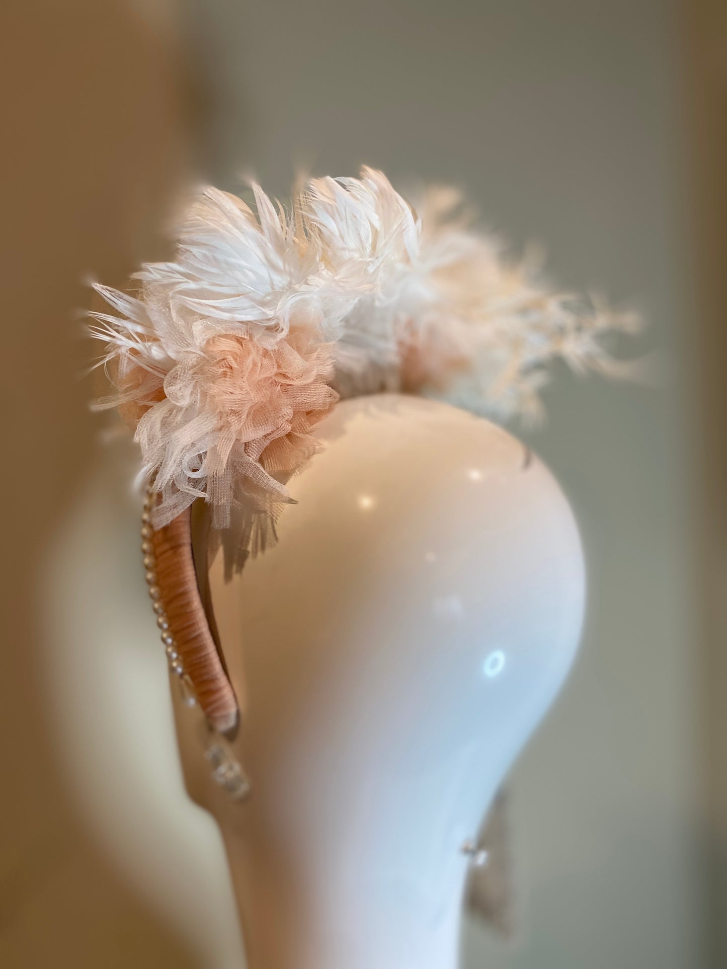 Fascinator in whites and peach