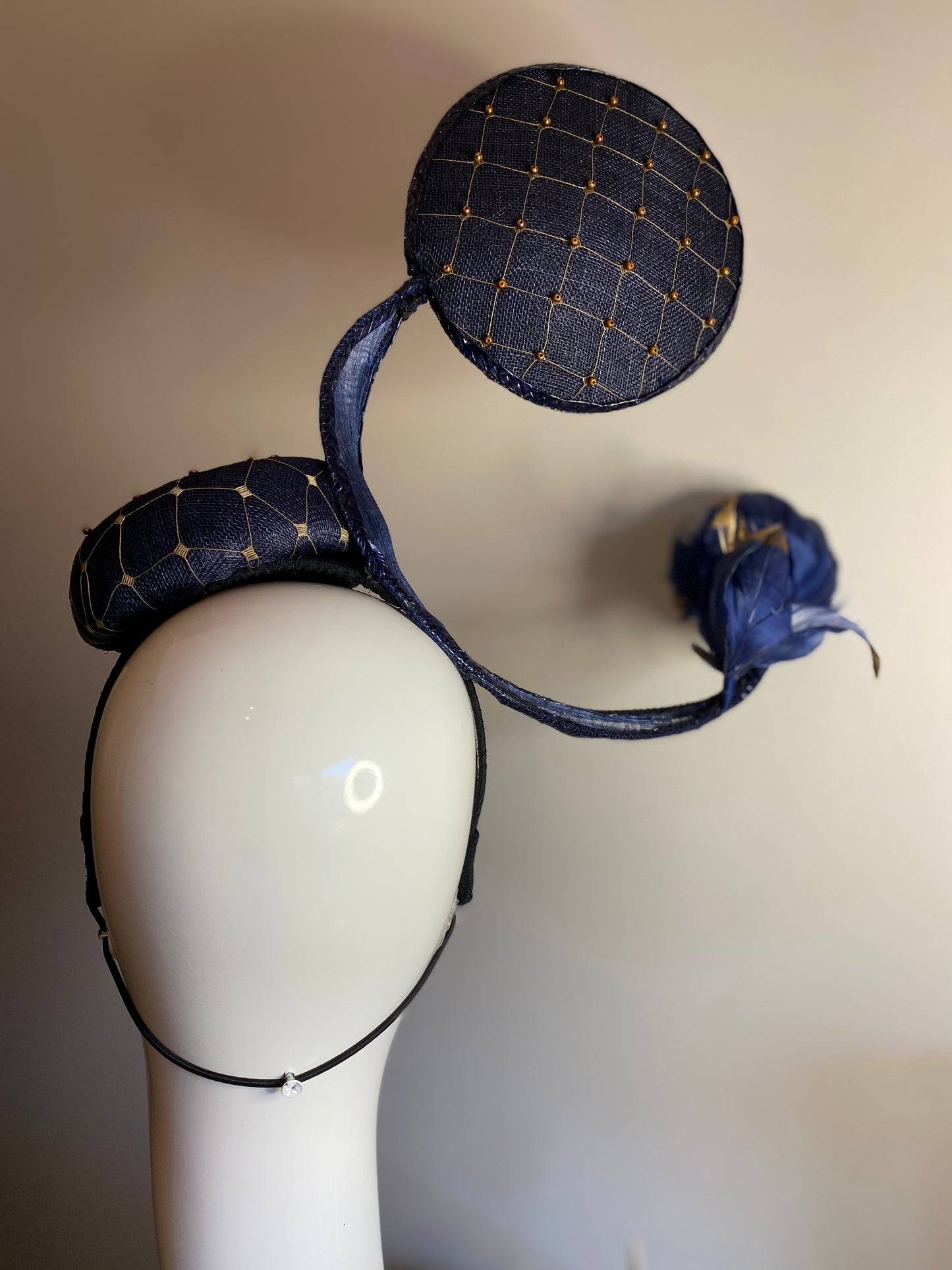 Navy and gold fascinator in 3D shapes