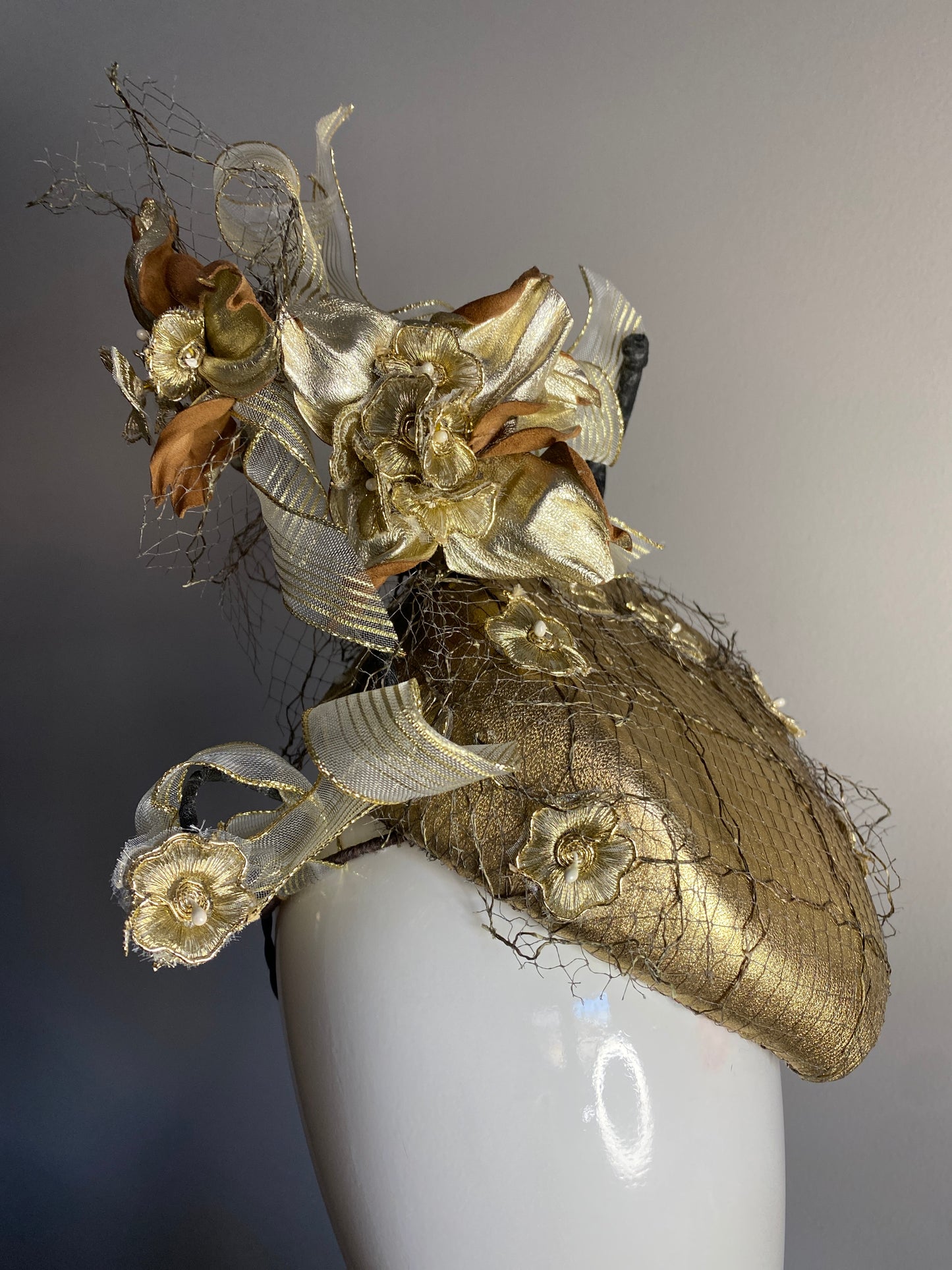 Gold percher with leather flowers