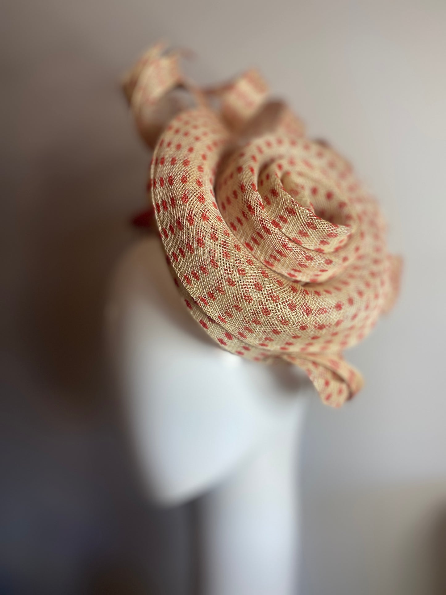 Red spotty sinamay swirl headpiece