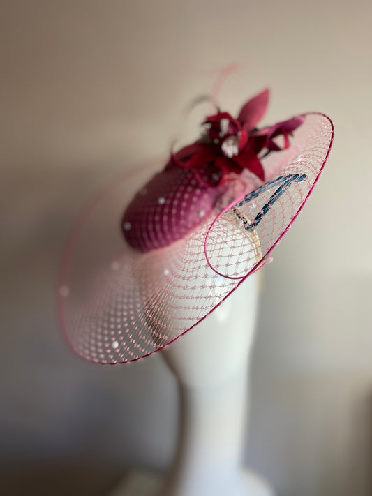 Magenta veiled brim button with leather flowers