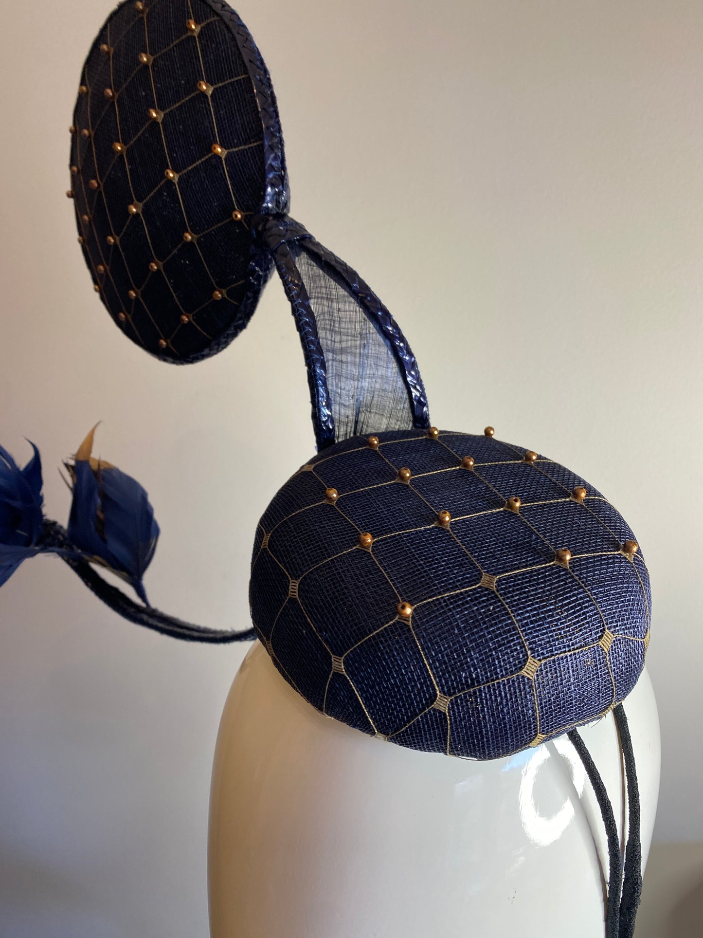 Navy and gold fascinator in 3D shapes