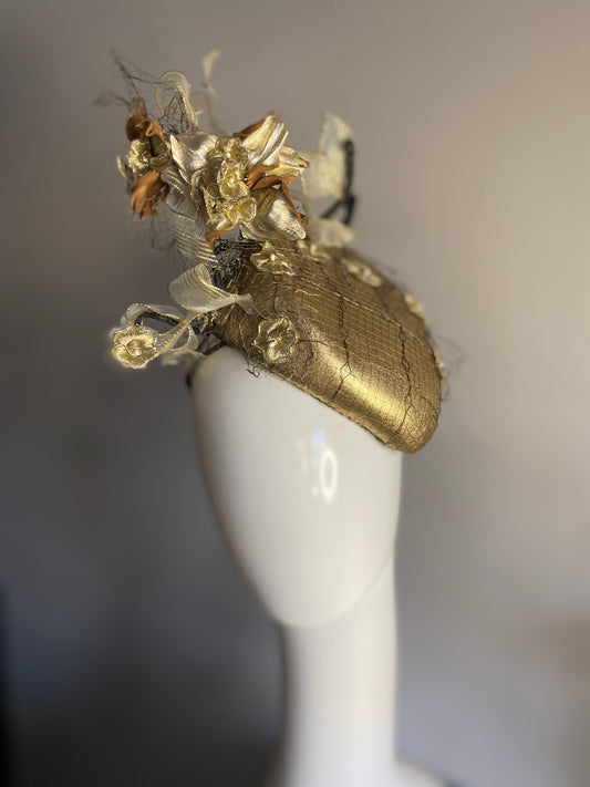 Gold percher with leather flowers