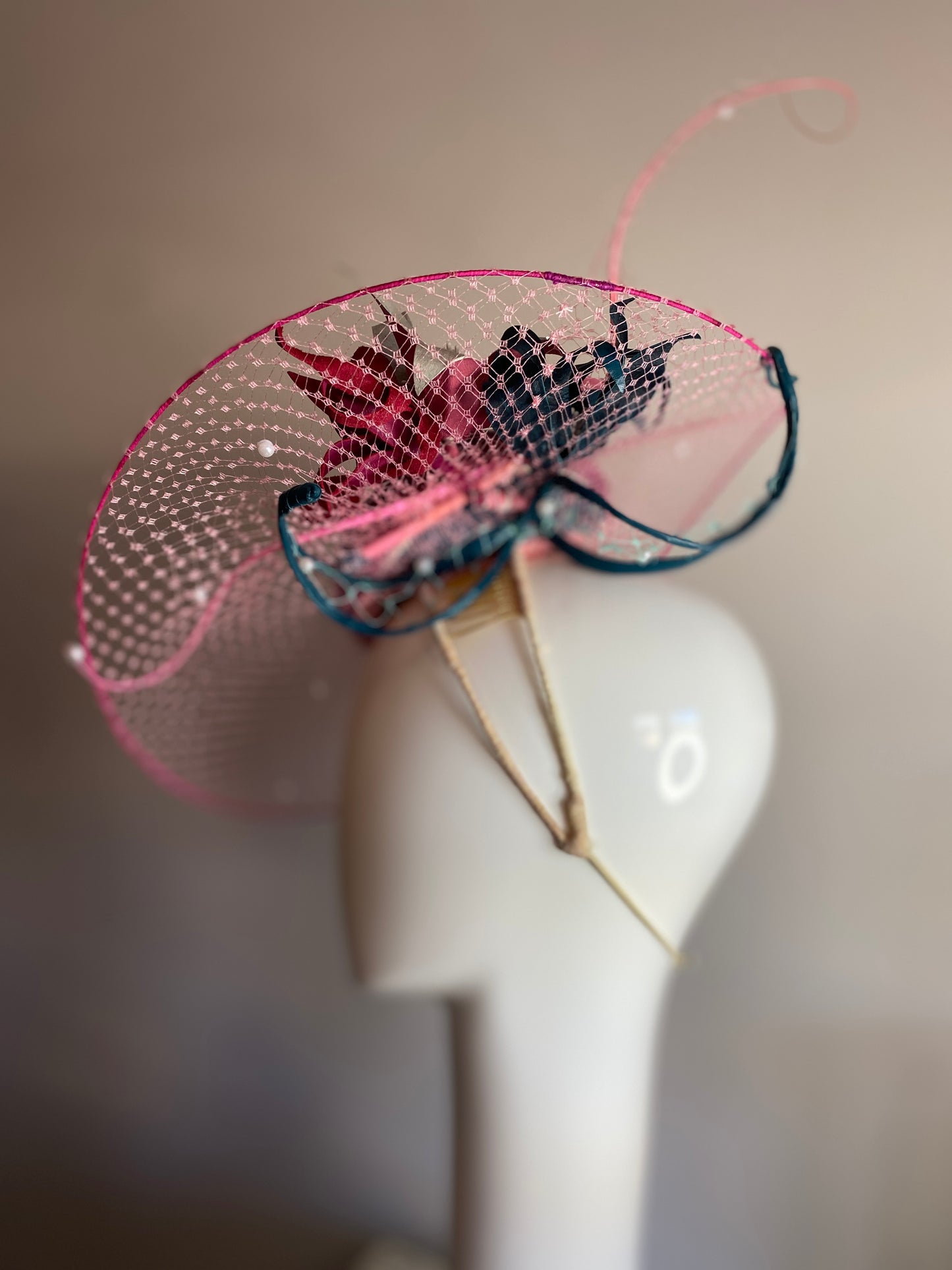 Magenta veiled brim button with leather flowers