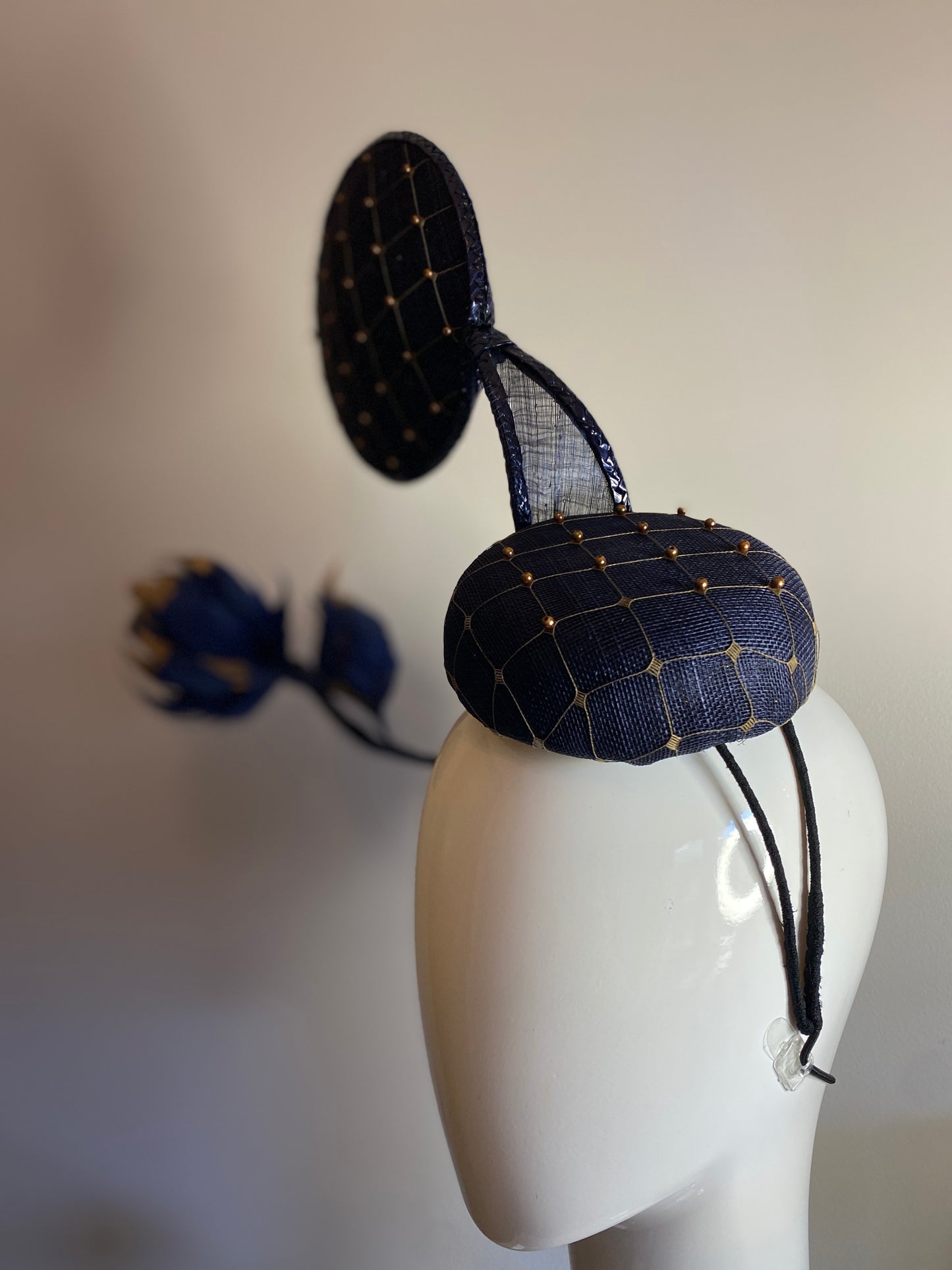 Navy and gold fascinator in 3D shapes