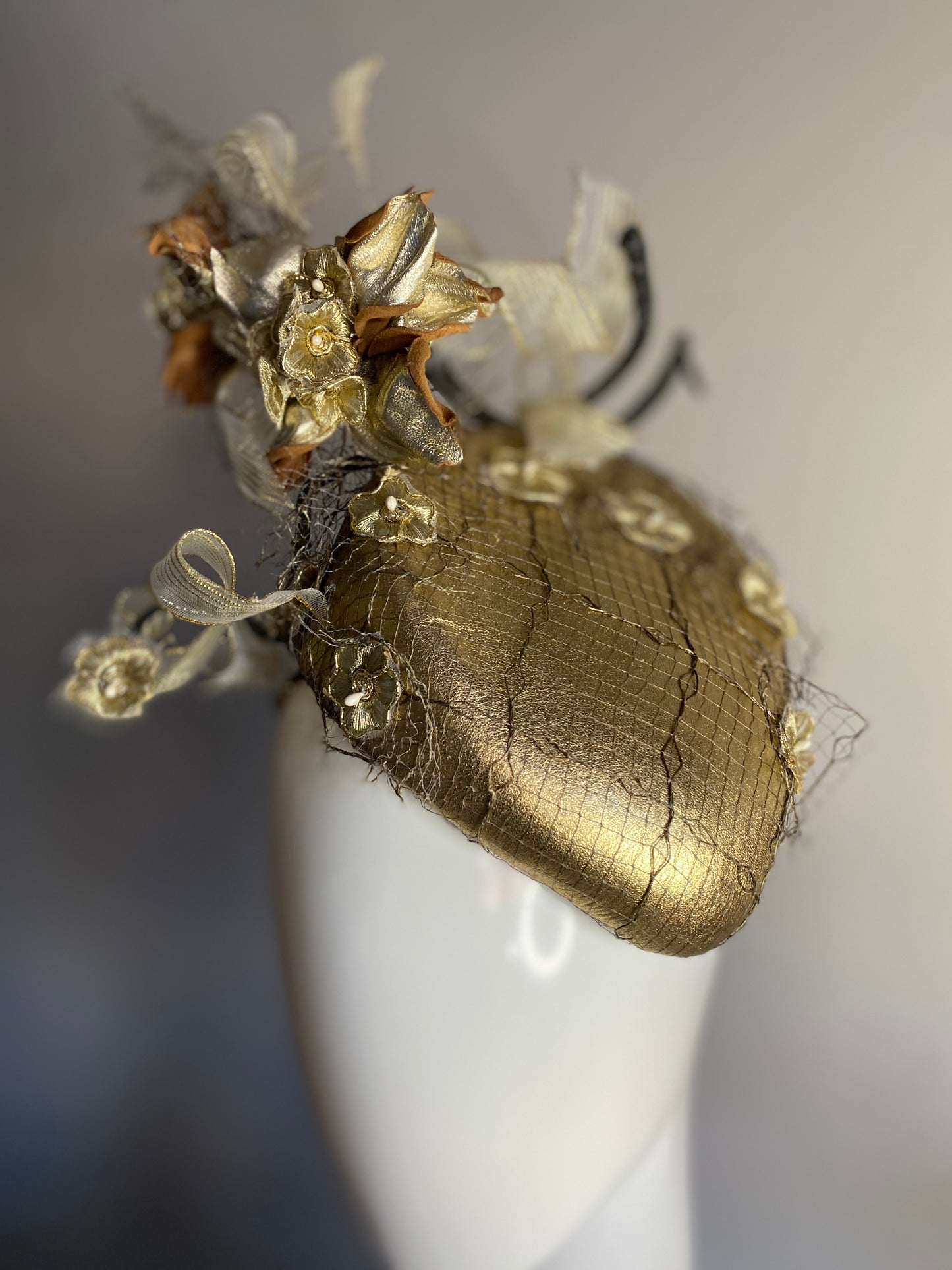 Gold percher with leather flowers