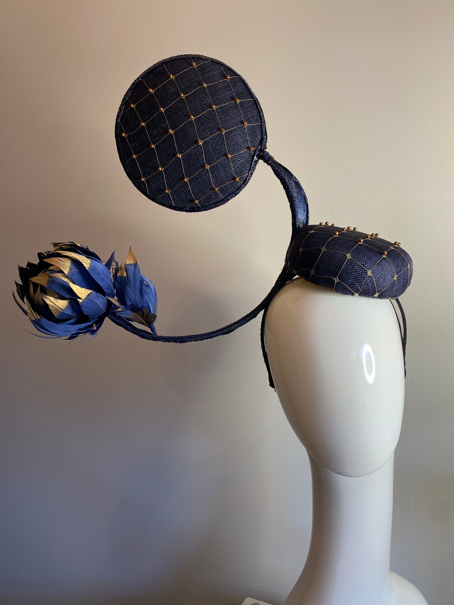 Navy and gold fascinator in 3D shapes