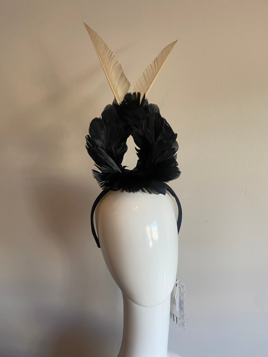 Black and gold feather fascinator