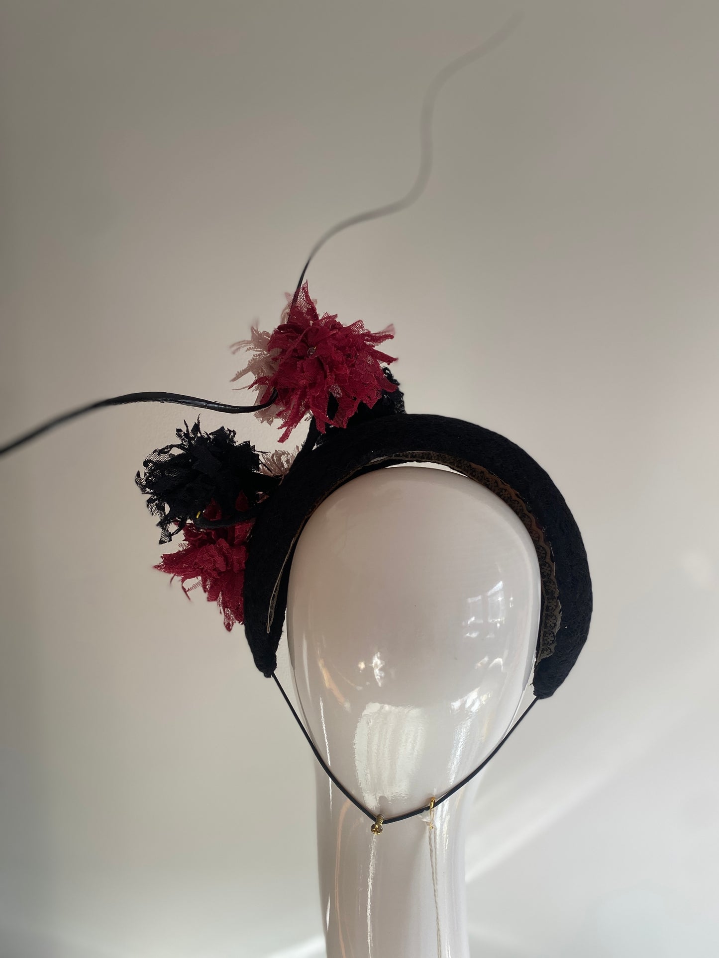 Black lace blocked headband with Pom poms