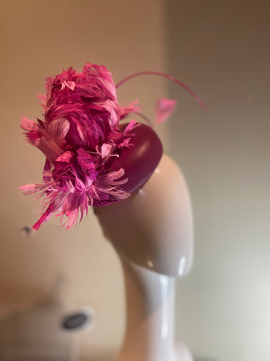 Magenta leather button with feather flowers